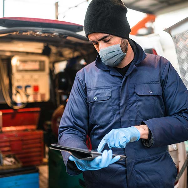 Mechanic in front of the van