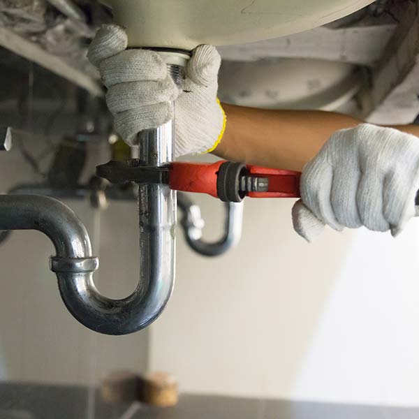 Man doing plumbing work