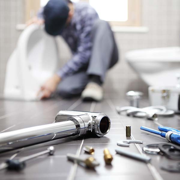 Man doing sewer work